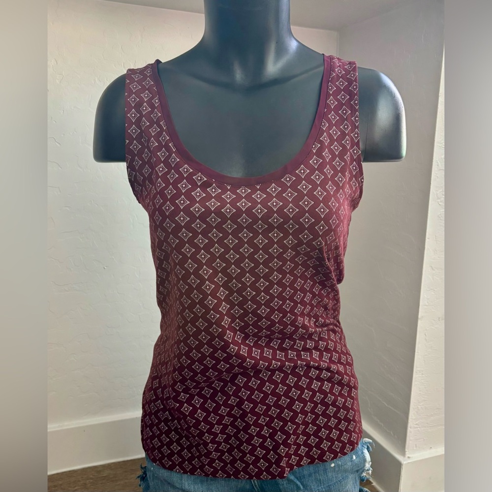 Sleeveless maroon blouse